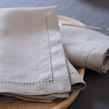 Beige napkin with decorative border