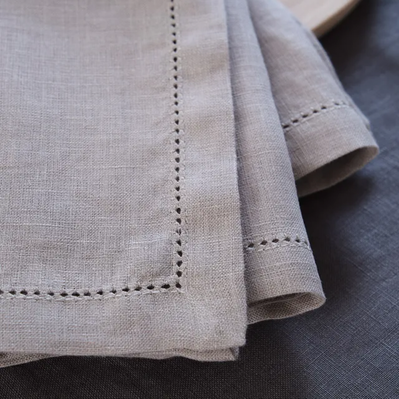 Beige napkin with decorative border