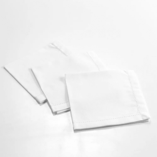White napkin with decorative border