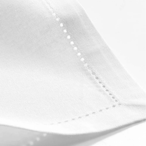 White napkin with decorative border
