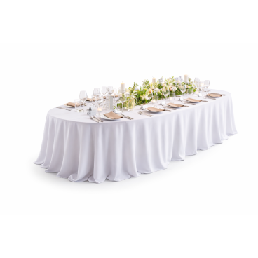 Elliptical table with white tablecloth